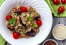 Colorful vegan Buddha bowl with vegetables and quinoa